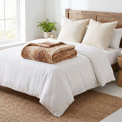 Deer blanket on bed