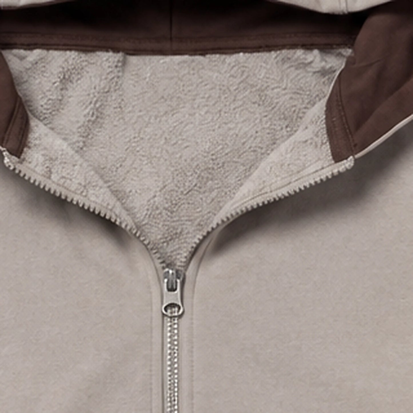 Sherpa lined hood and zipper detail
